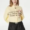 TwistREGULAR FIT SLOGAN PRINTED CROP - Skjorta - Yellow -Vero Moda butik. 48f16bc67f19409c9d61e3a3a6cb2512